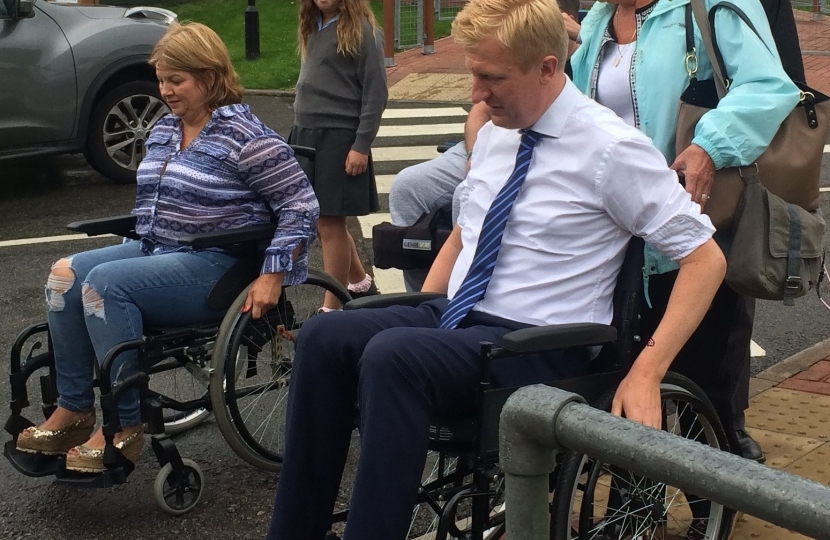 Oliver Dowden MP taking part in the 'Wheelchair Challenge'