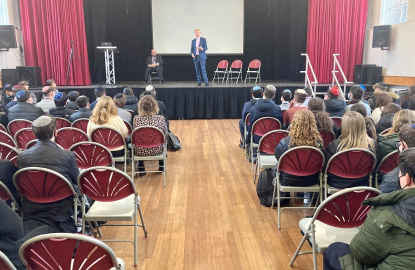 Oliver speaking to the Sixth Form