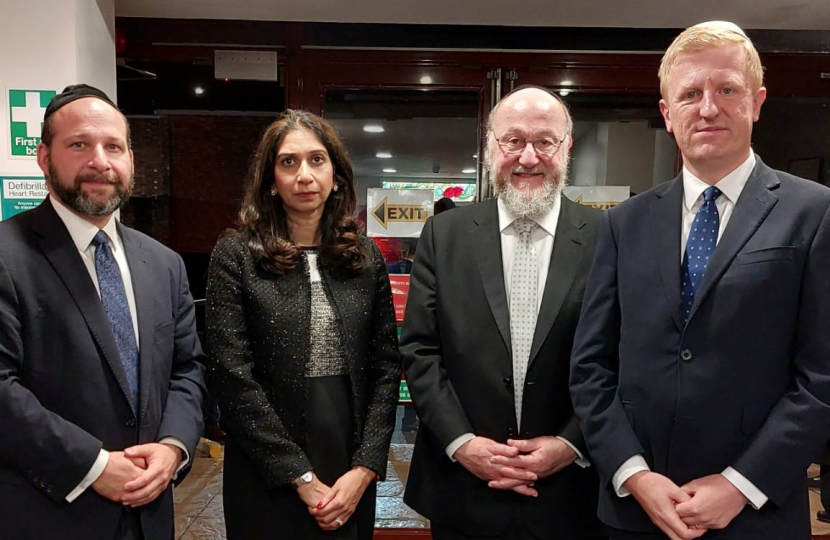 Oliver with (from left to right) with Rabbi Elchonon Feldman of Bushey United Synagogue, Home Secretary Suella Braverman MP and Chief Rabbi Ephraim Mirvis.