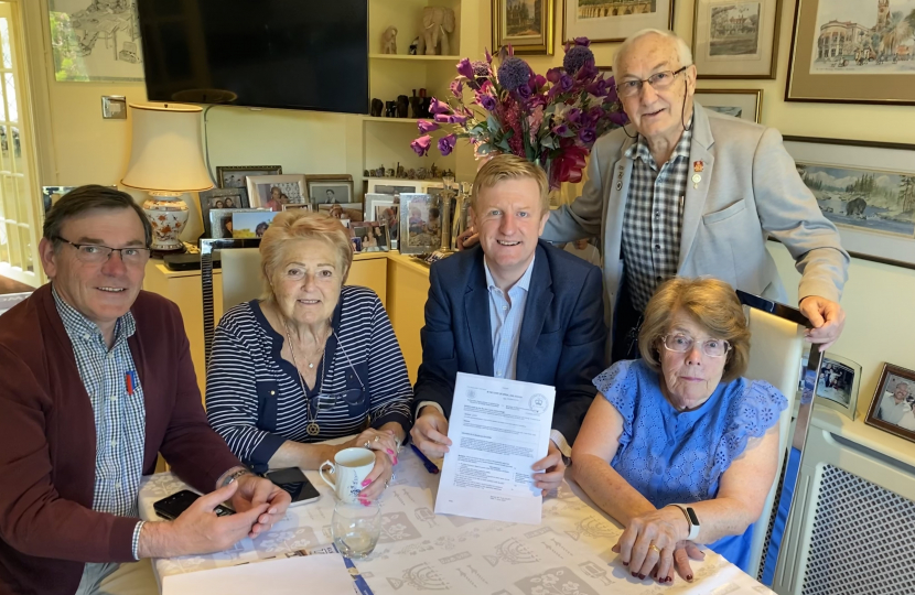 Mr Dowden with members of Woodcock Hill Village Green Committee