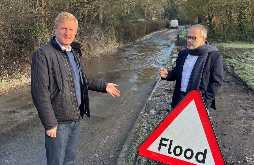 Oliver and Cllr Morris Bright MBE Inspecting Road Surfaces at Rectory Lane in Shenley