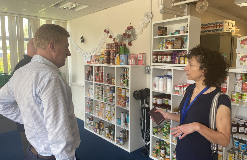 Sir Oliver Dowden MP with volunteer Carolyne