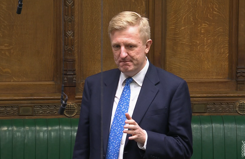 Sir Oliver speaking in Parliament