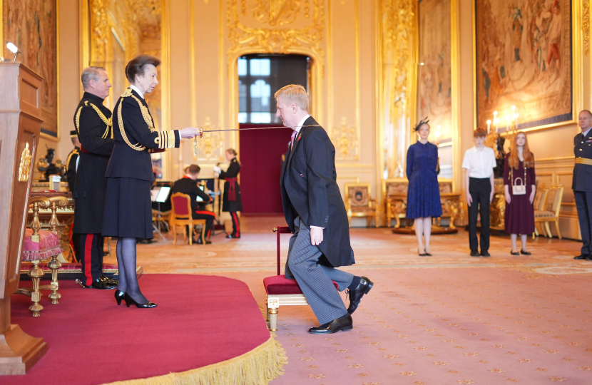 Sir Oliver receiving the Knight Commander of the Order of the Bath, presented by Her Royal Highness, Princess Anne, The Princess Royal at the Investiture