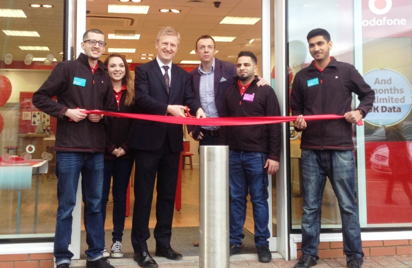 Oliver cutting ribbon