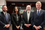 Oliver with (from left to right) with Rabbi Elchonon Feldman of Bushey United Synagogue, Home Secretary Suella Braverman MP and Chief Rabbi Ephraim Mirvis.