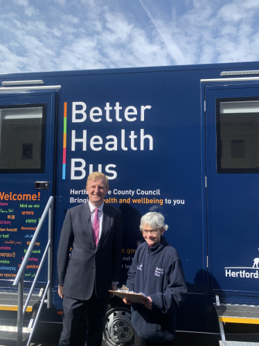 Sir Oliver Dowden MP with Hertfordshire County Council's Better Health Bus team, who offer mobile health checks, support, and advice throughout the county 