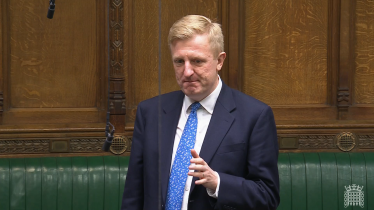 Sir Oliver speaking in Parliament